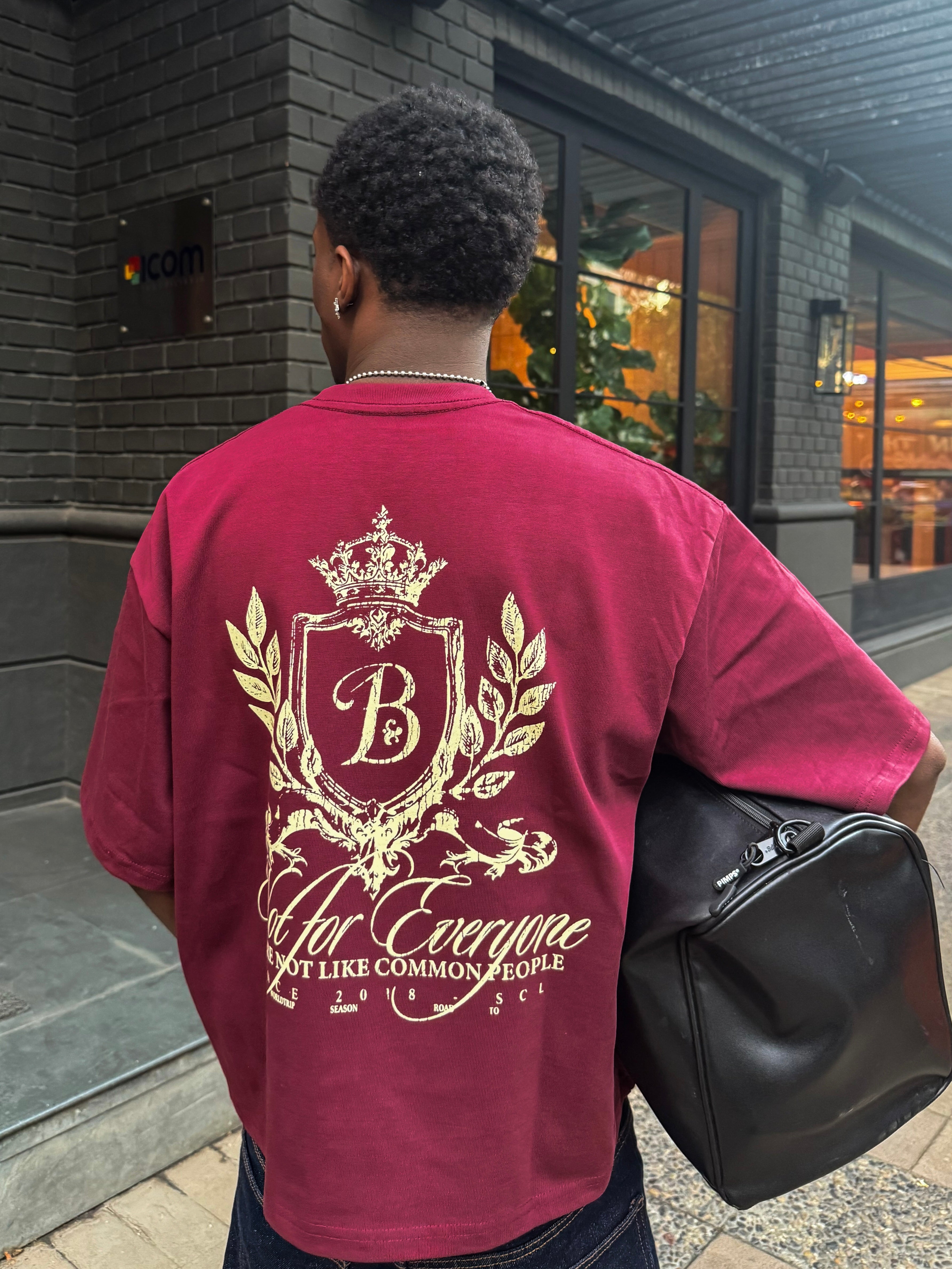 Polera burdeo escudo Bo worldtrip algodón grueso